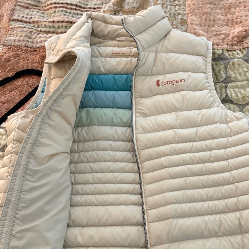 Cotopaxi Off-White Puffer Vest with Teal and Light Blue Stripes